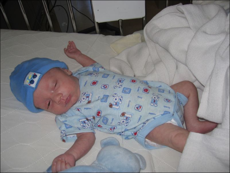 Owen dressed and ready to go home
